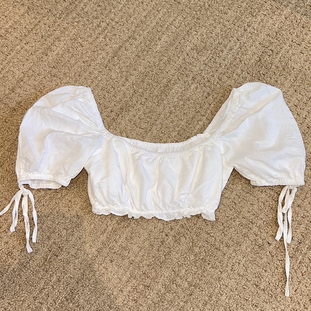 White crop top with puffy tie sleeves